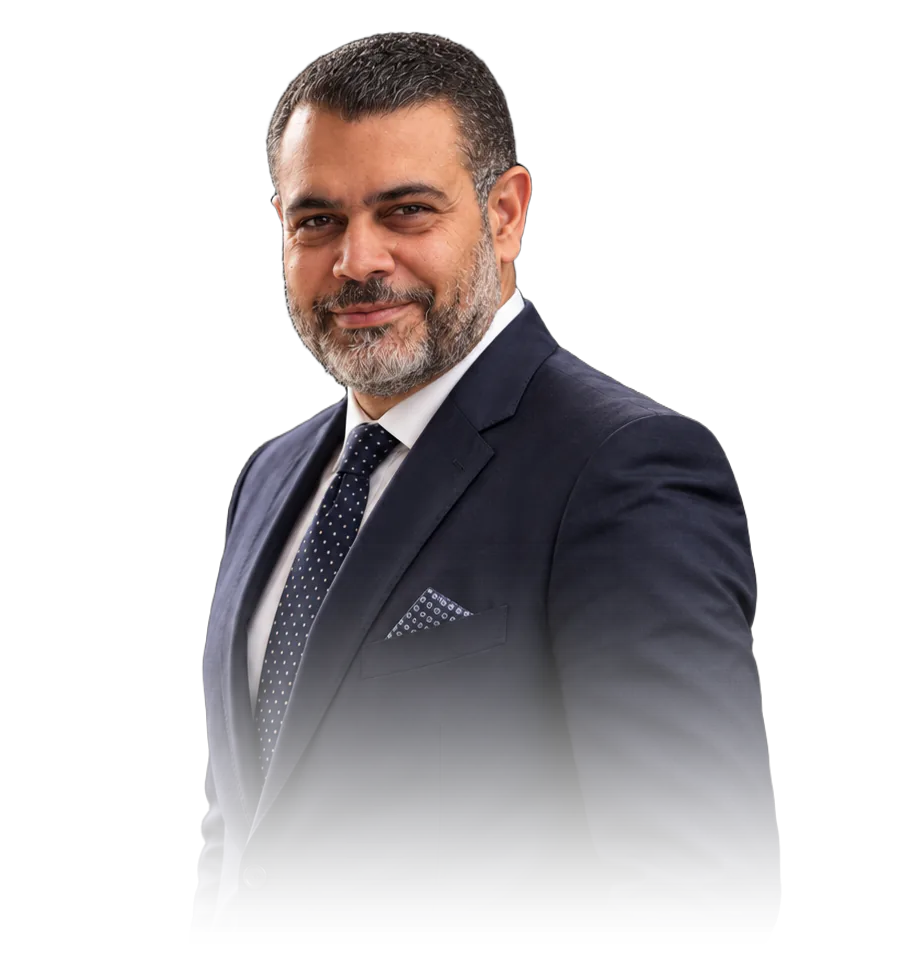 Portrait of Prof. Dr. Mohamed Mokhtar Mabrouk in a navy suit